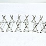 12 silver-plated metal knife handles, in a case.