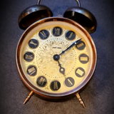 Mechanical alarm clock bell in vintage copper