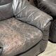 Pair of patinated leather club armchairs