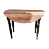 Oval table with flaps