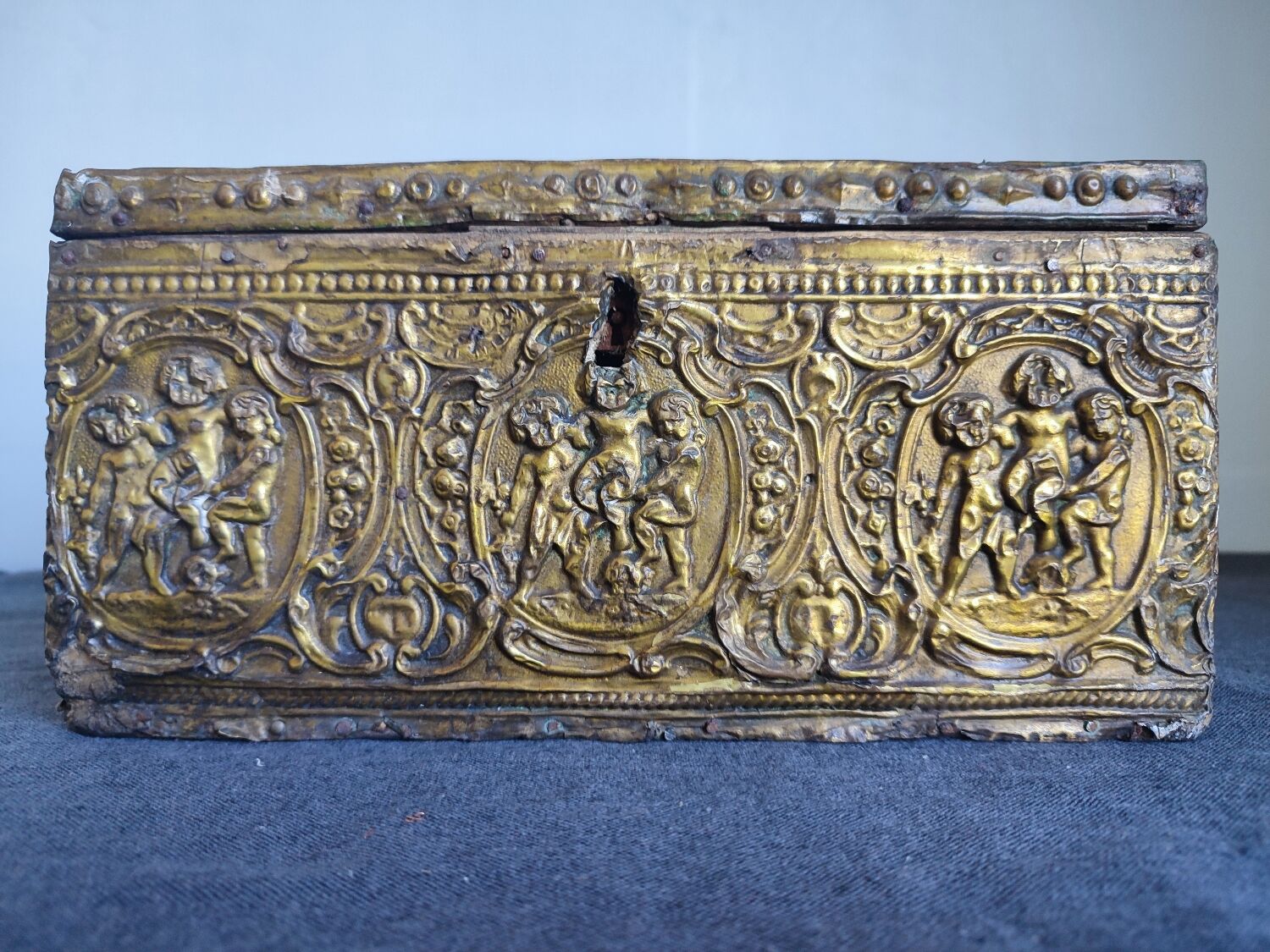 Old wooden box/casket covered with brass