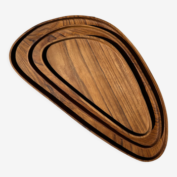 Trio of rounded triangular shaped trays or cups in monoxyl teak