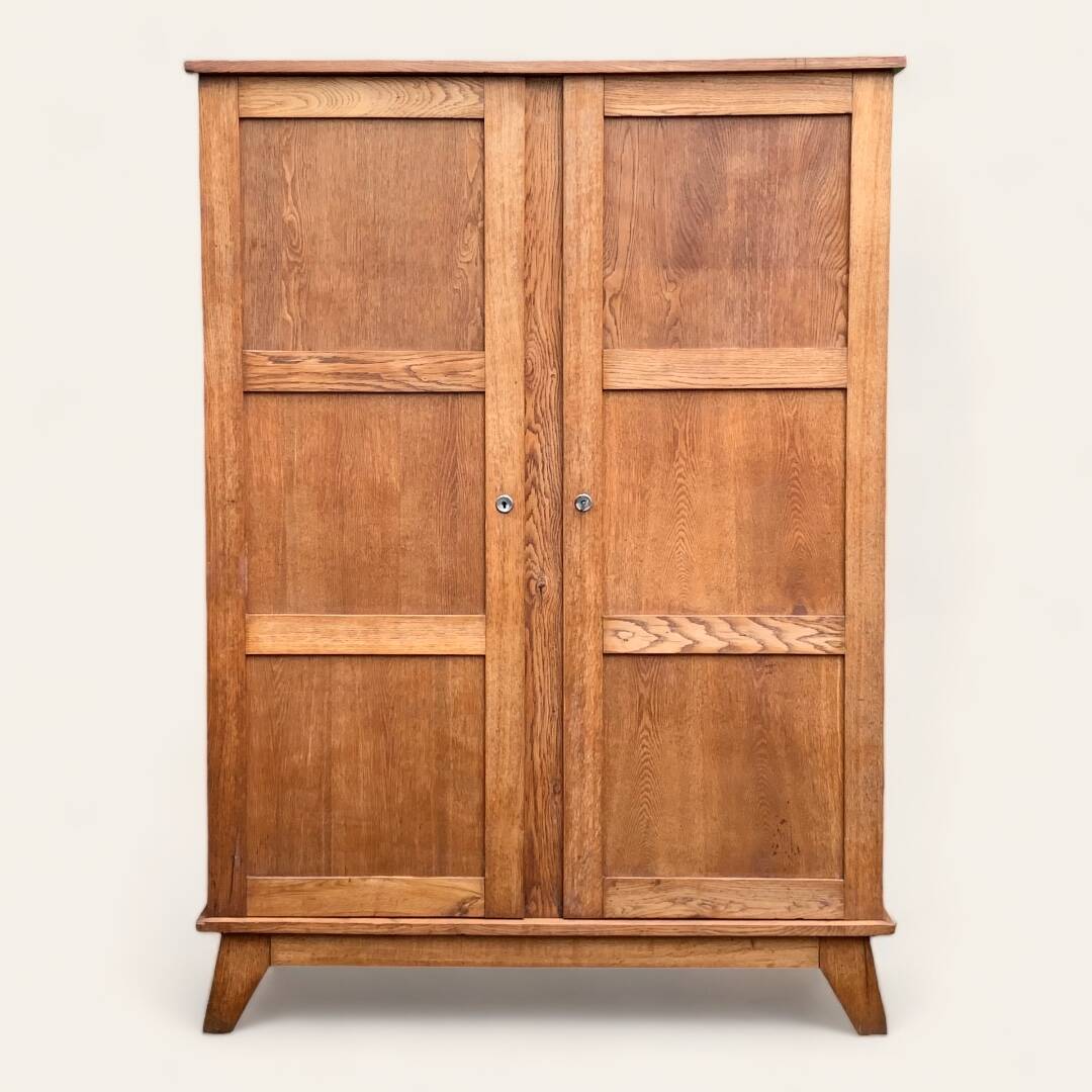 Solid oak compass foot cabinet René Gabriel 1945
