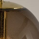 Large smoked glass ball pendant by Limburg in brass, Germany, 1970s.