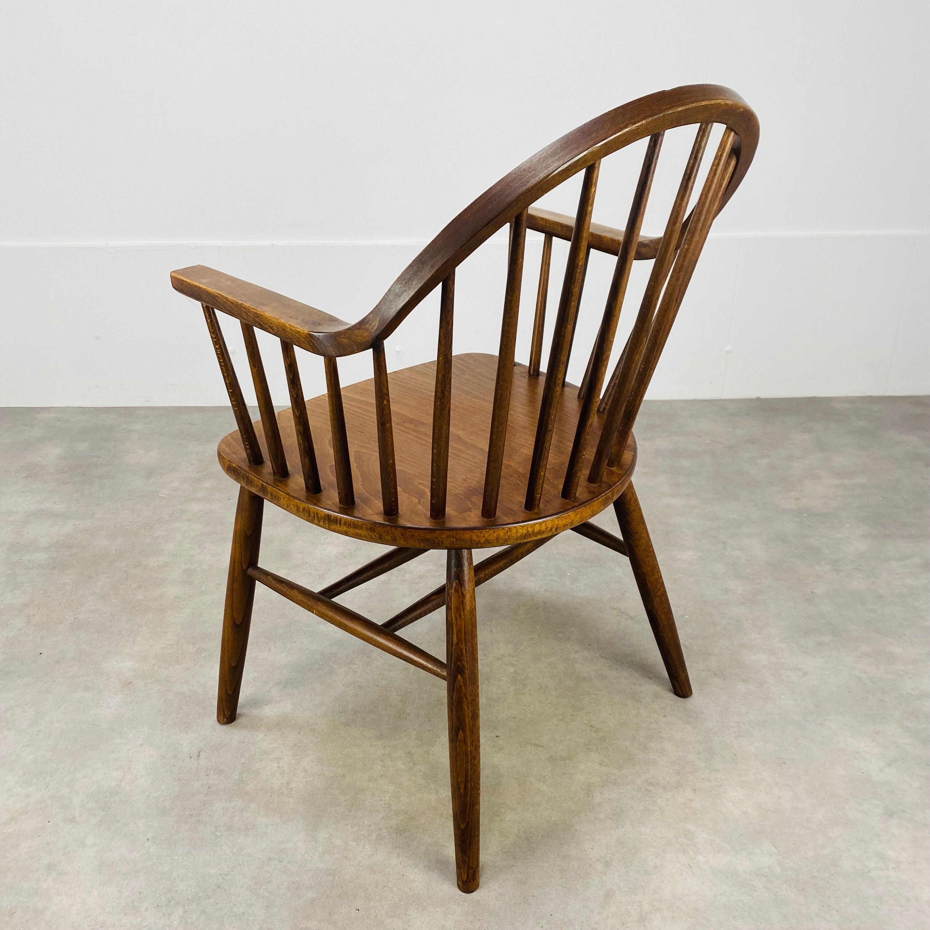 Baumann armchair with Scandinavian style bars, desk