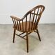 Baumann armchair with Scandinavian style bars, desk