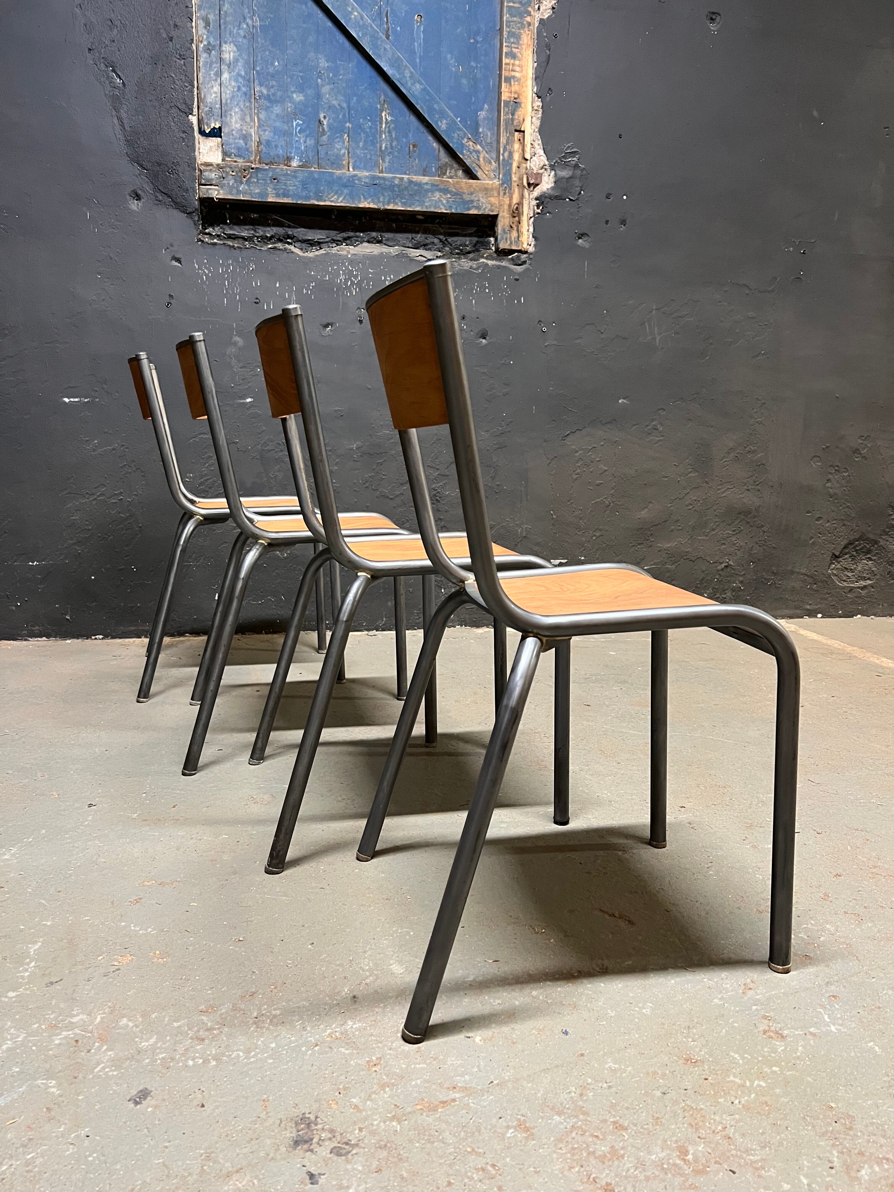 Set of Mulca school chairs patinated graphite.