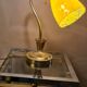 Golden steel lamp, with tulip old marbled yellow glass paste,