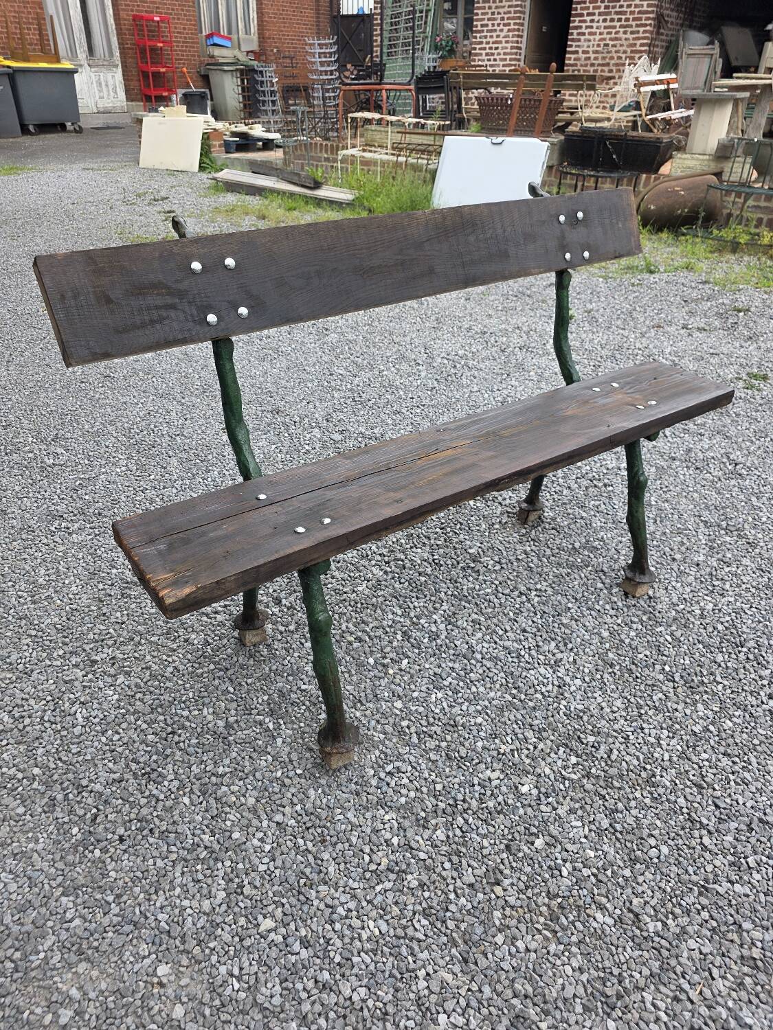 Cast iron garden bench with solid oak seat