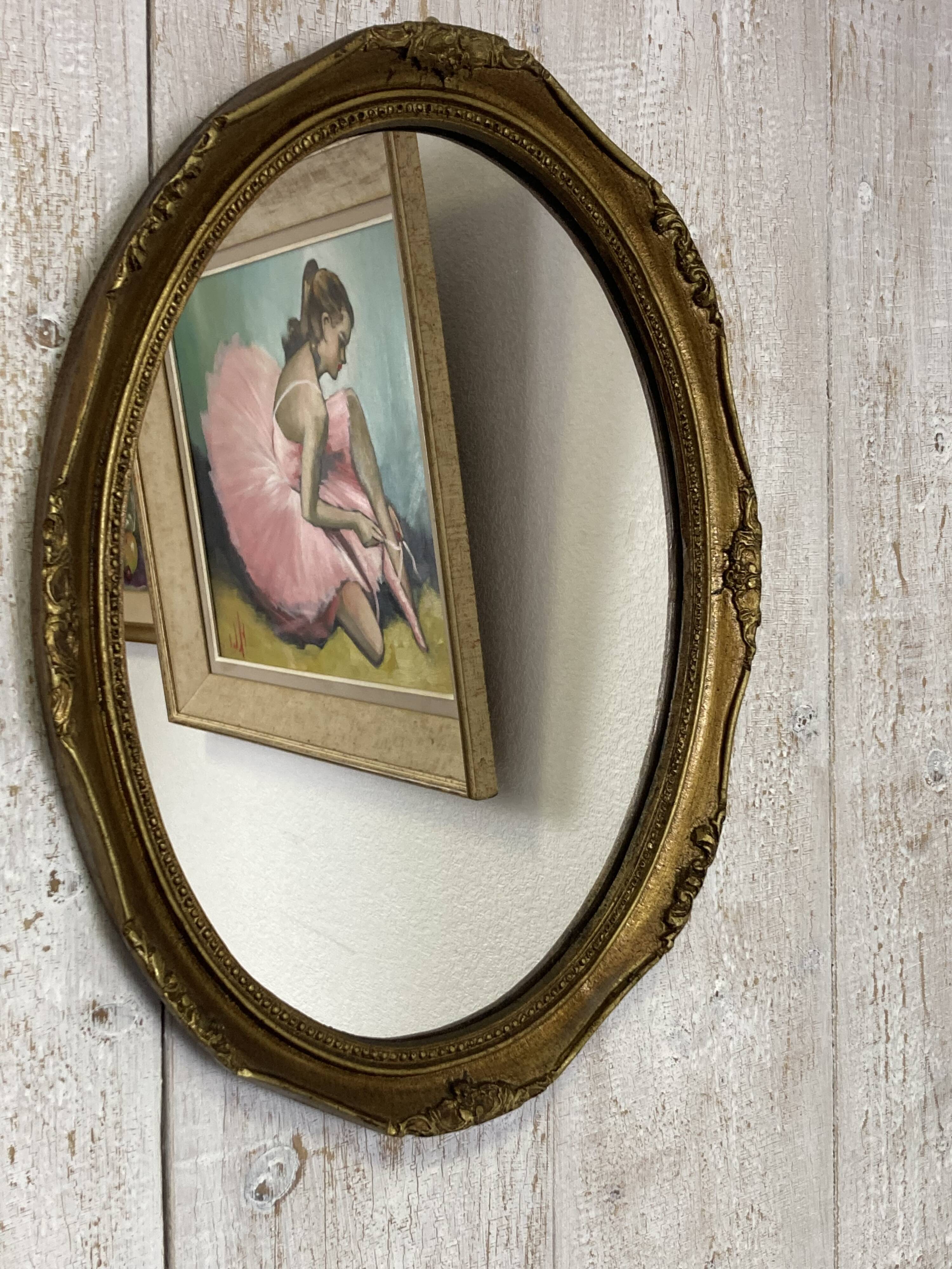 Antique oval mirror