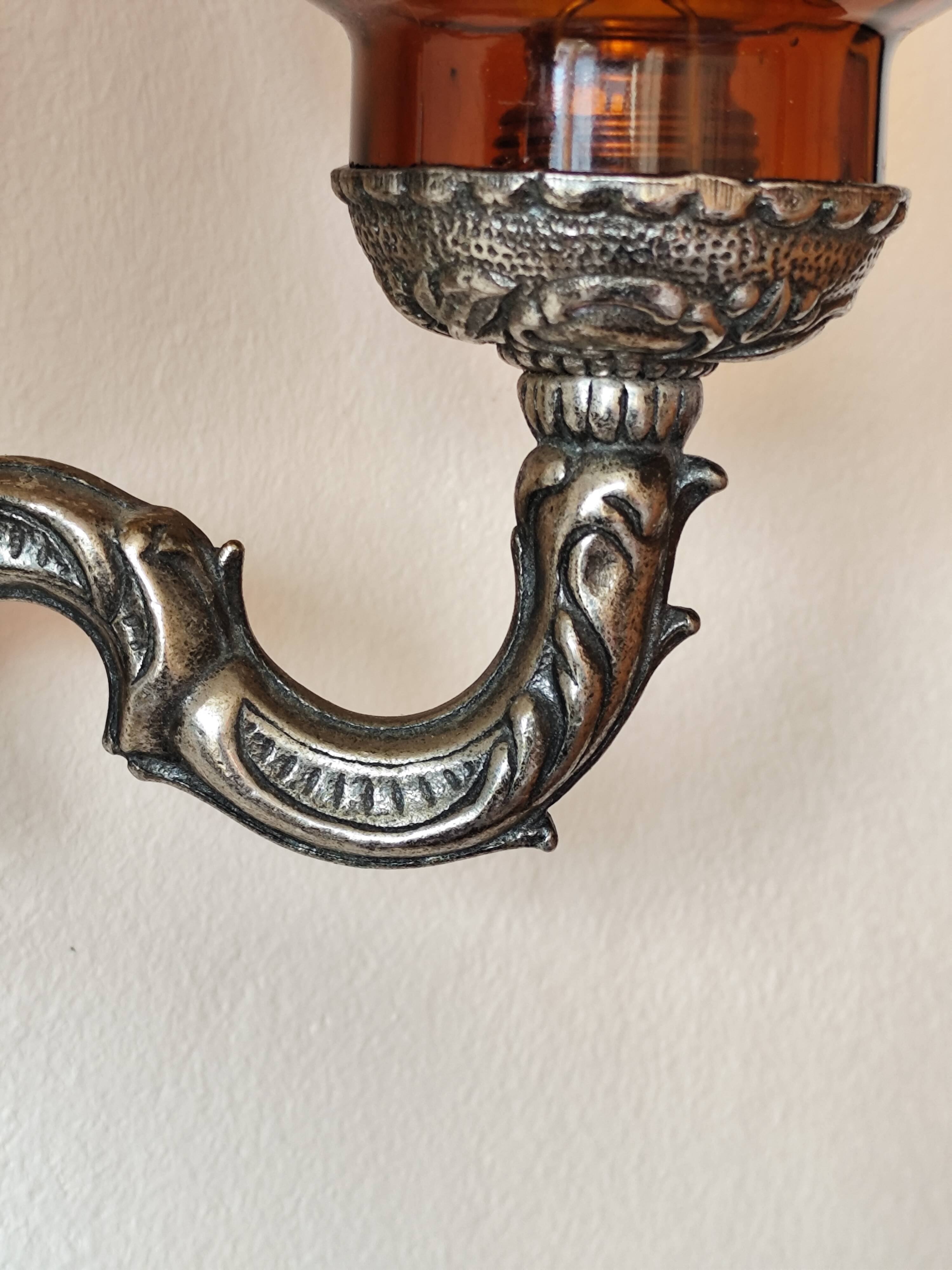 Silver-colored chiseled metal wall light, 2 lights with orange glass tulip