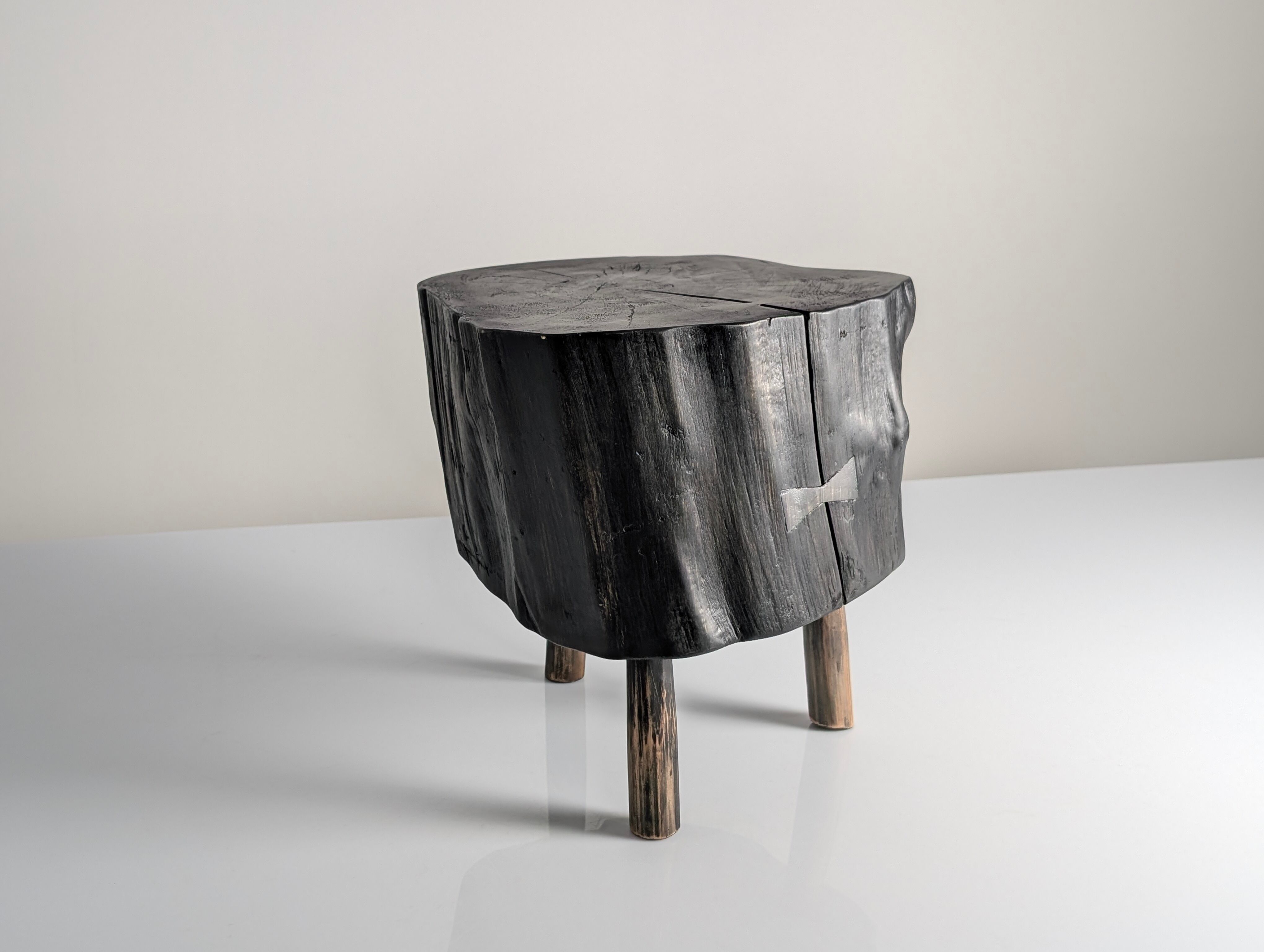 Wabi-Sabi black ebonised wood stool with butterfly joints