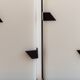 Pair of modernist metal wall lights with perspex diffuser, 1950s/1960s