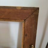 Frame with channels in wood and gilded stucco