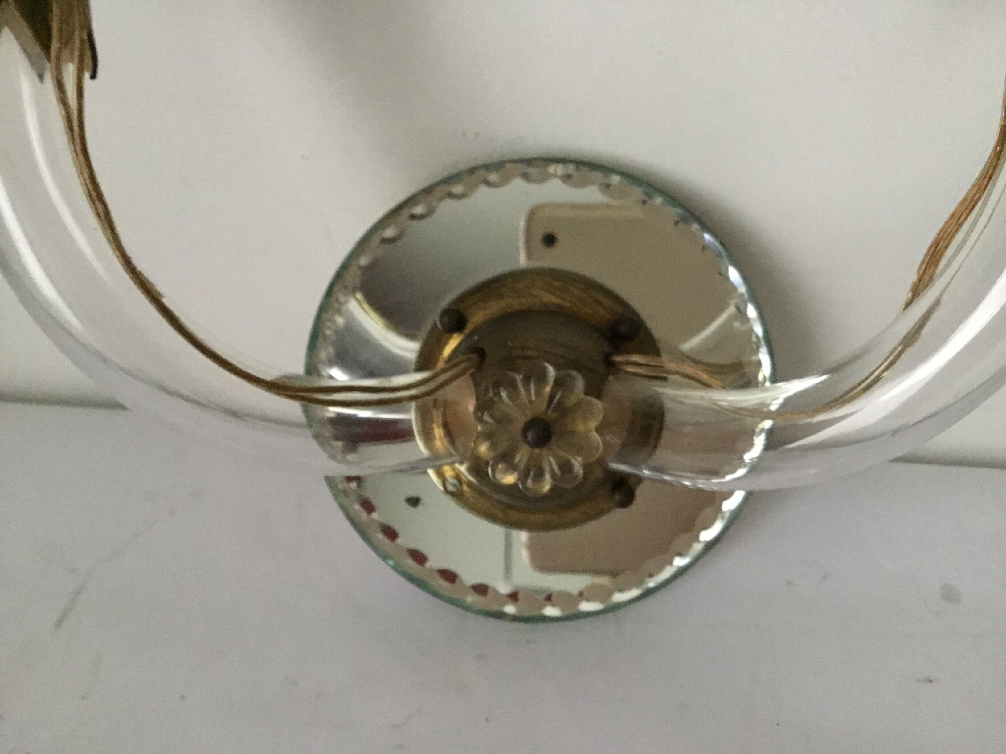 Pair of glass and mirror sconces