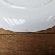 Old ceramic plate with scene of life and blue floral decor Van Melle