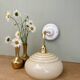 Vintage angled wall lamp with pale yellow opaline shade