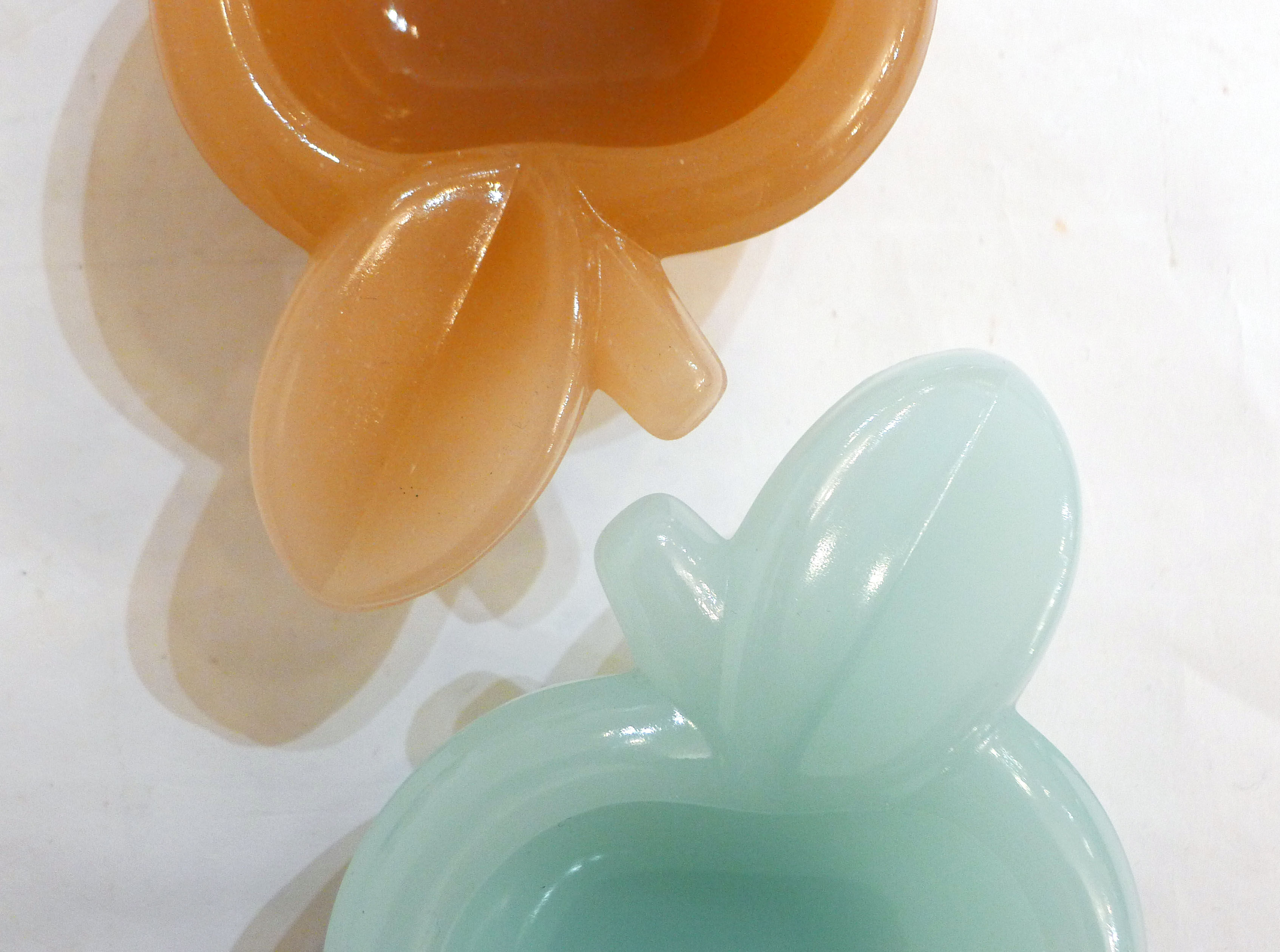 Pair of Apple opalin ashtrays