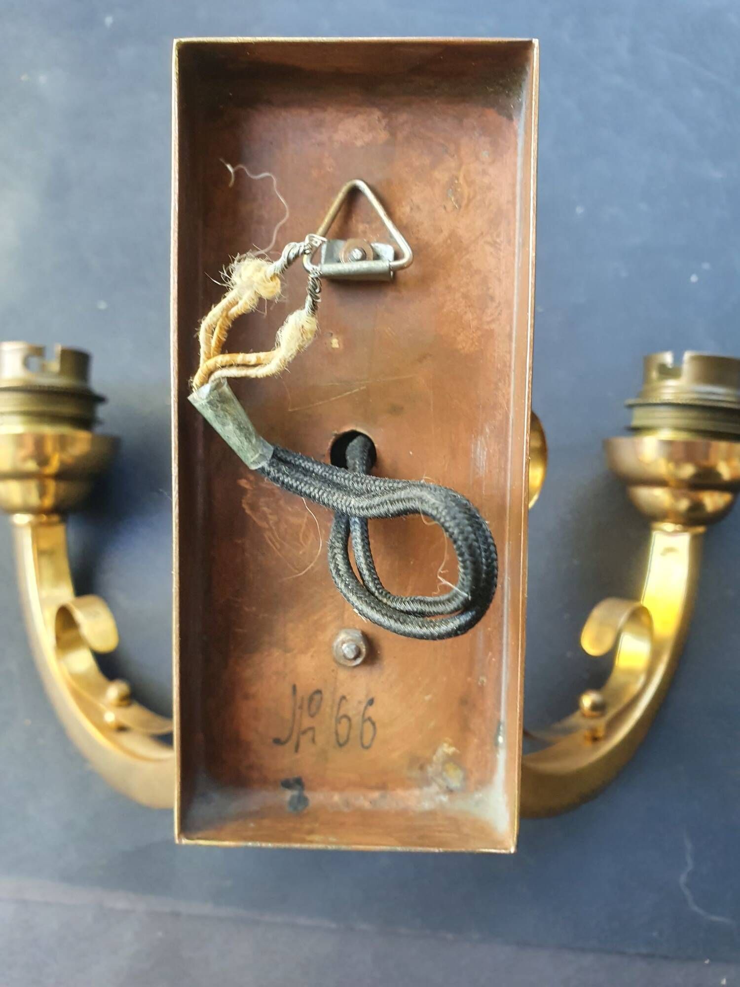 Pair of bronze wall sconces with 1940s Art Deco lampshades.