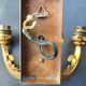 Pair of bronze wall sconces with 1940s Art Deco lampshades.
