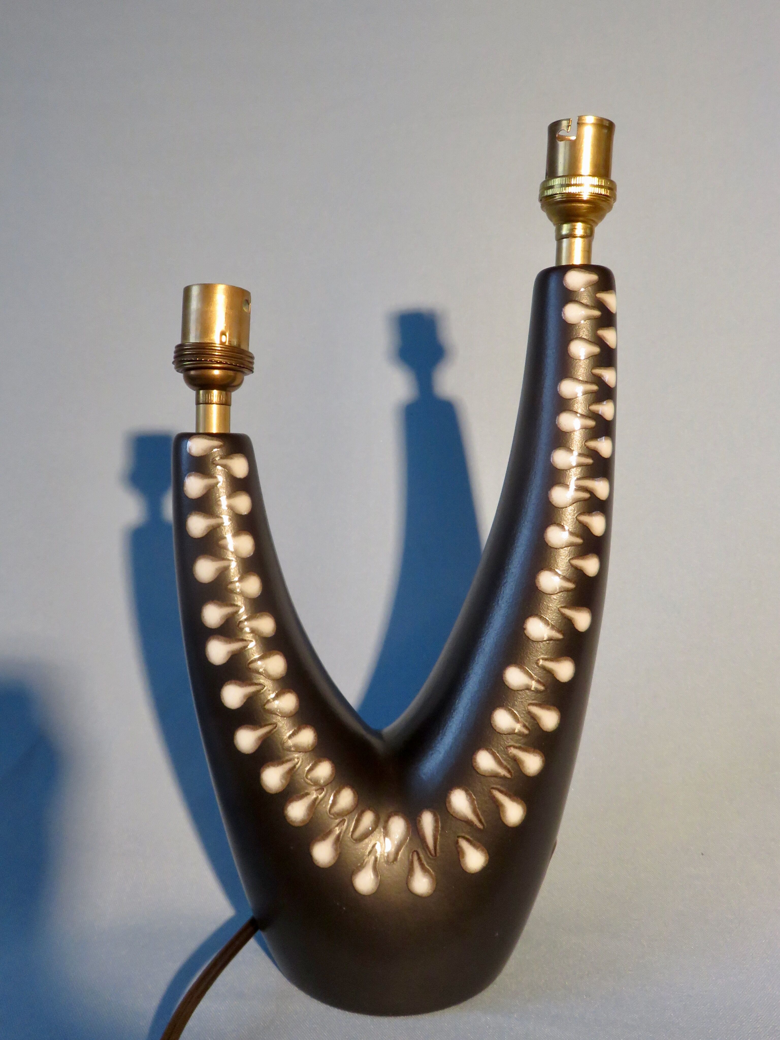 Sandstone bedside lamp with two asymmetrical arms. Soholm. Denmark 1955