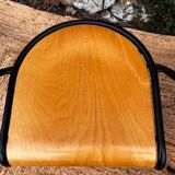 Pair of wooden and black metal chairs