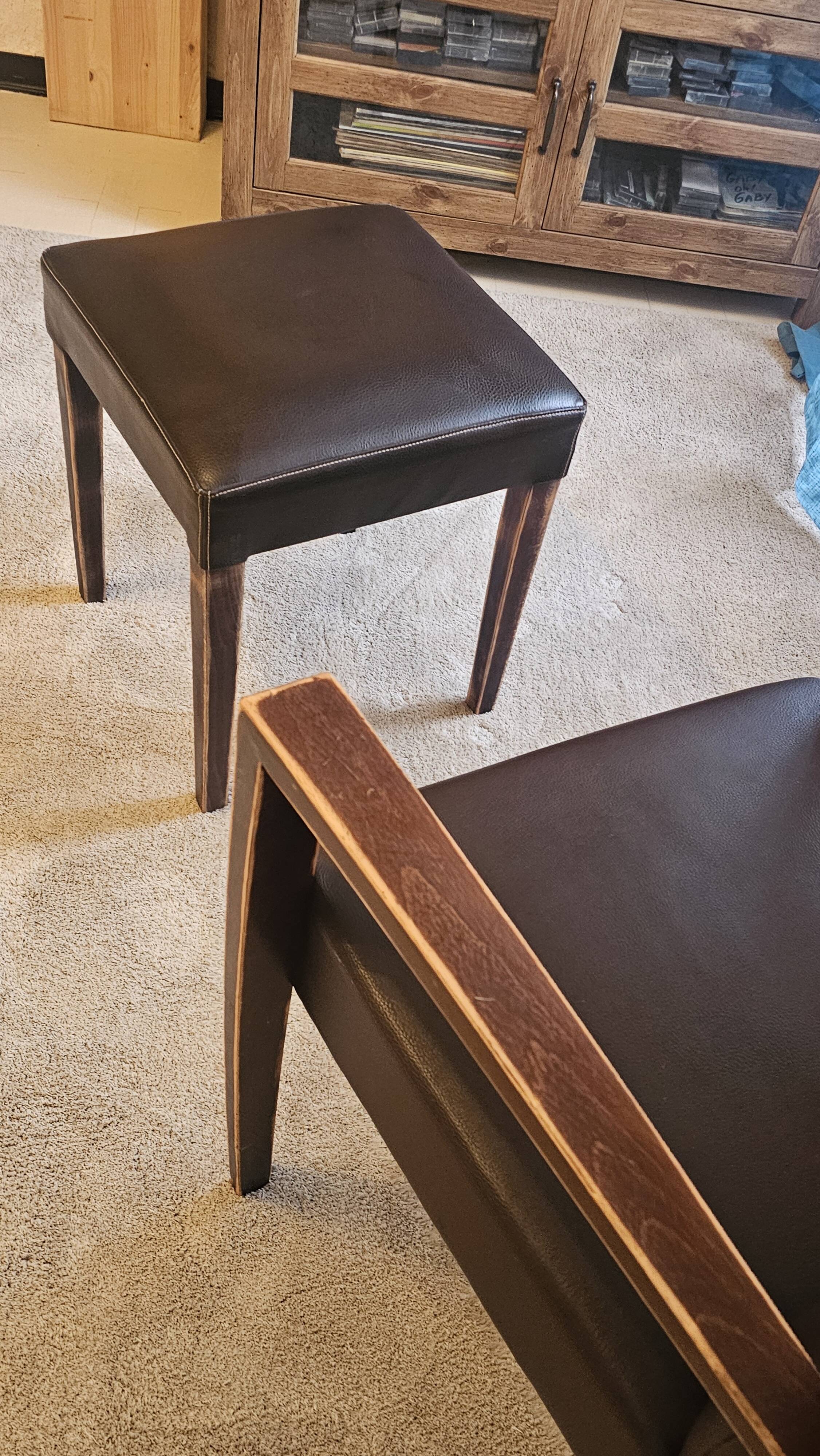 Armchair and faux leather footrest