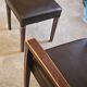 Armchair and faux leather footrest