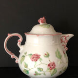 Old white and pink teapot