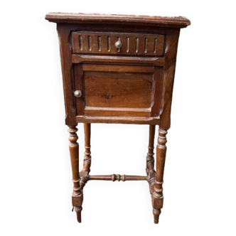 Wooden bedside table with marble top