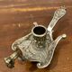 Brass peacock candle holder