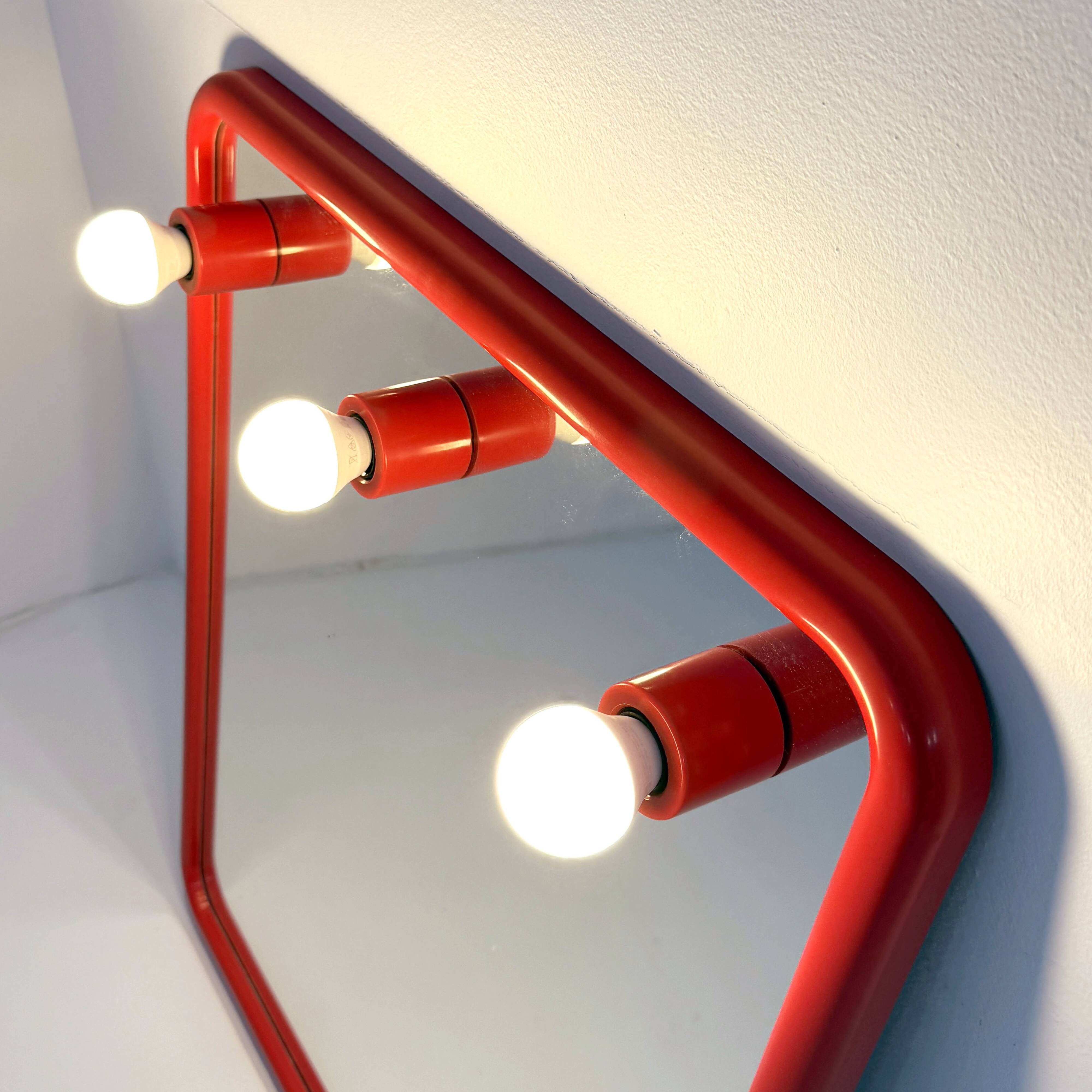 Red mirror with integrated light bulbs by Metalplastica, 1970