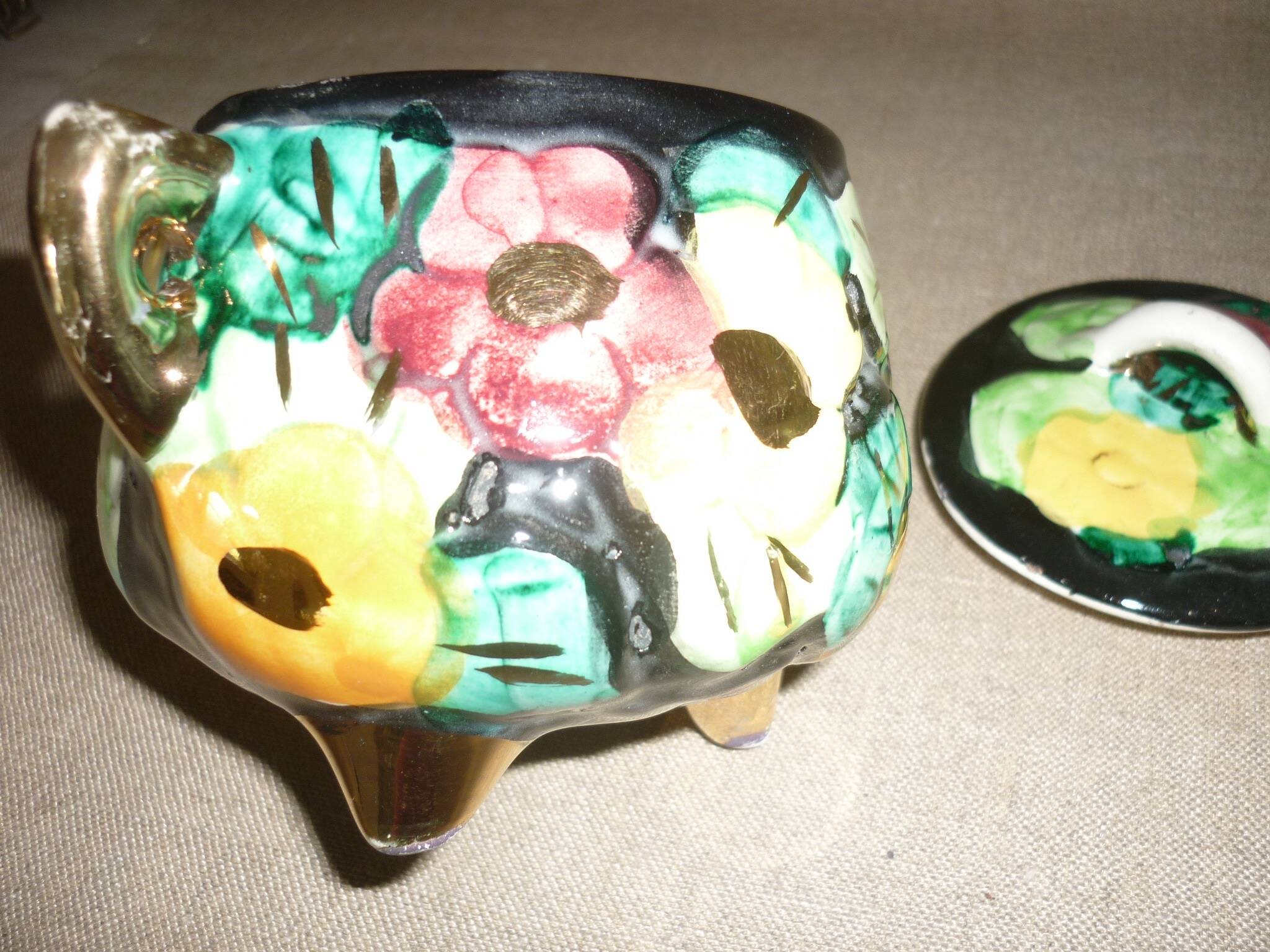 Multicolored ceramic covered tripod pot