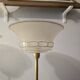Art Deco table lamps with frosted glass shade and brass base.