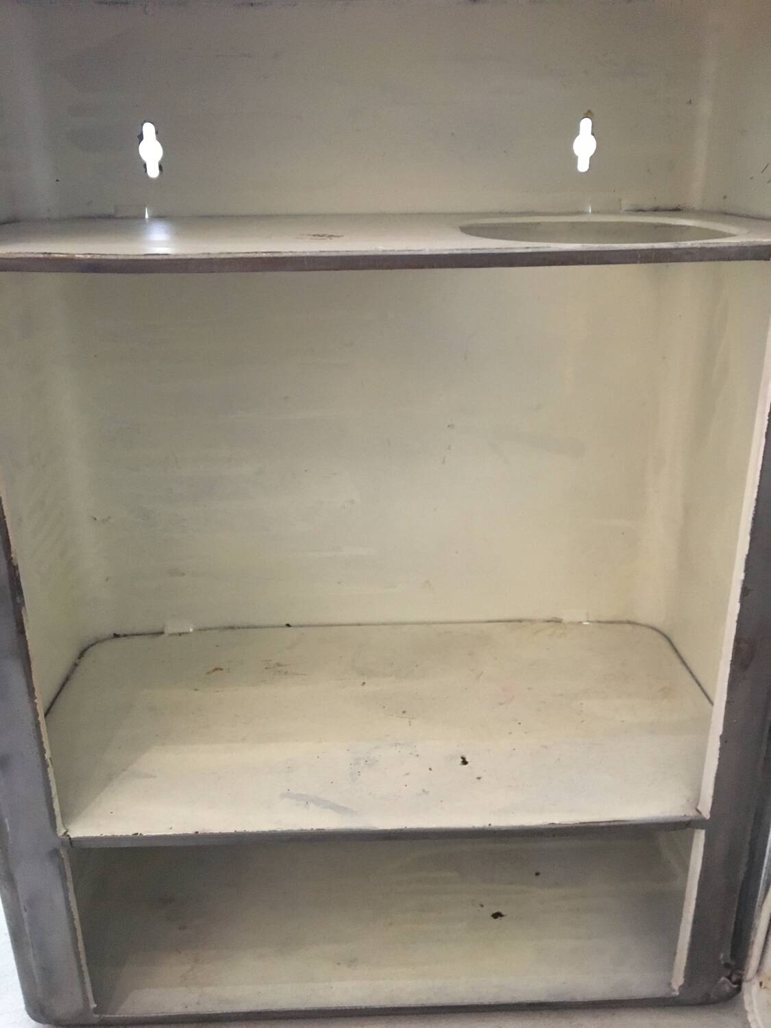 Gray metal medicine cabinet