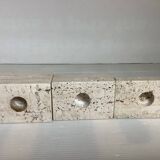 Trio of travertine candlesticks