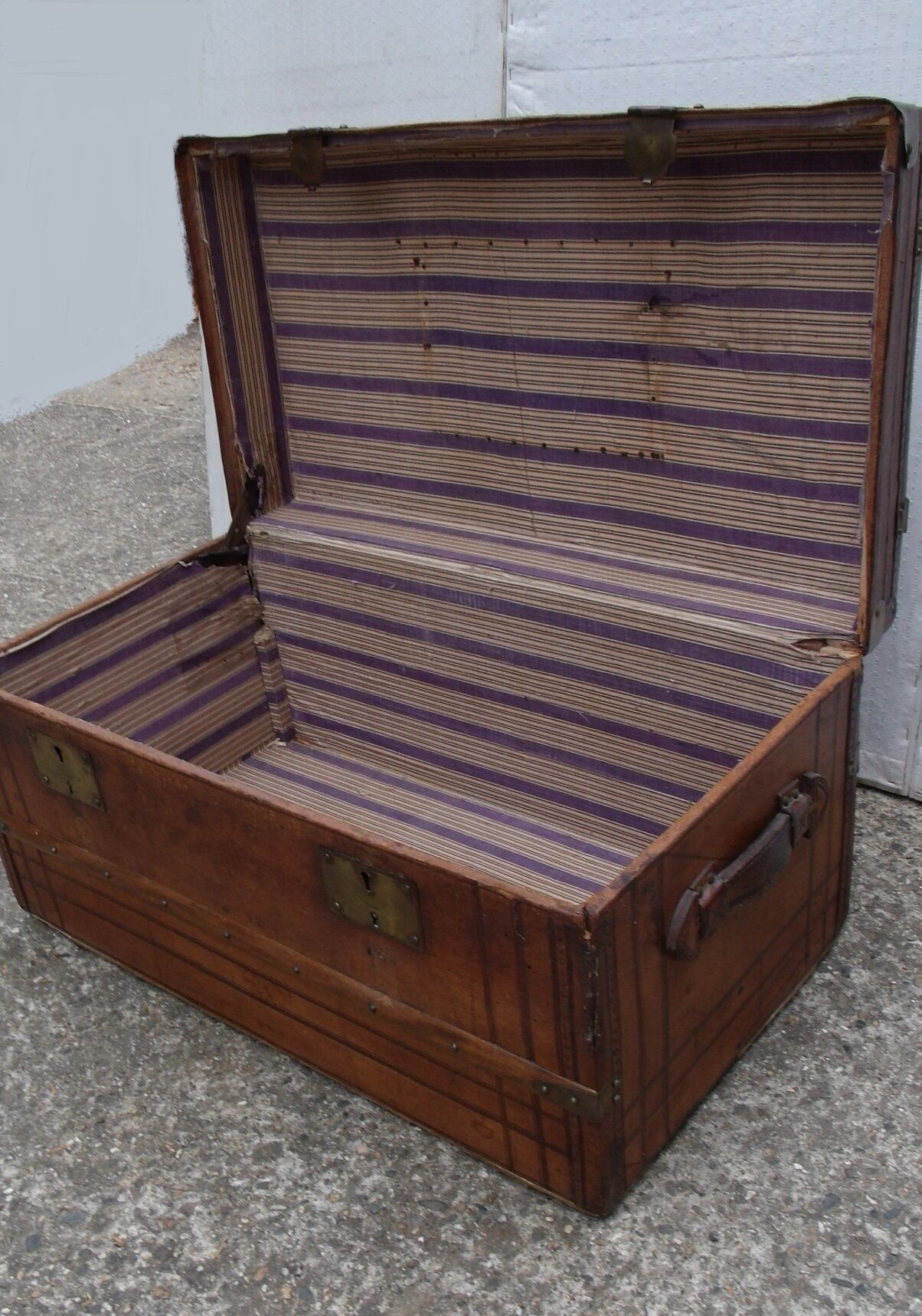 Old wooden trunk covered leather travel chest