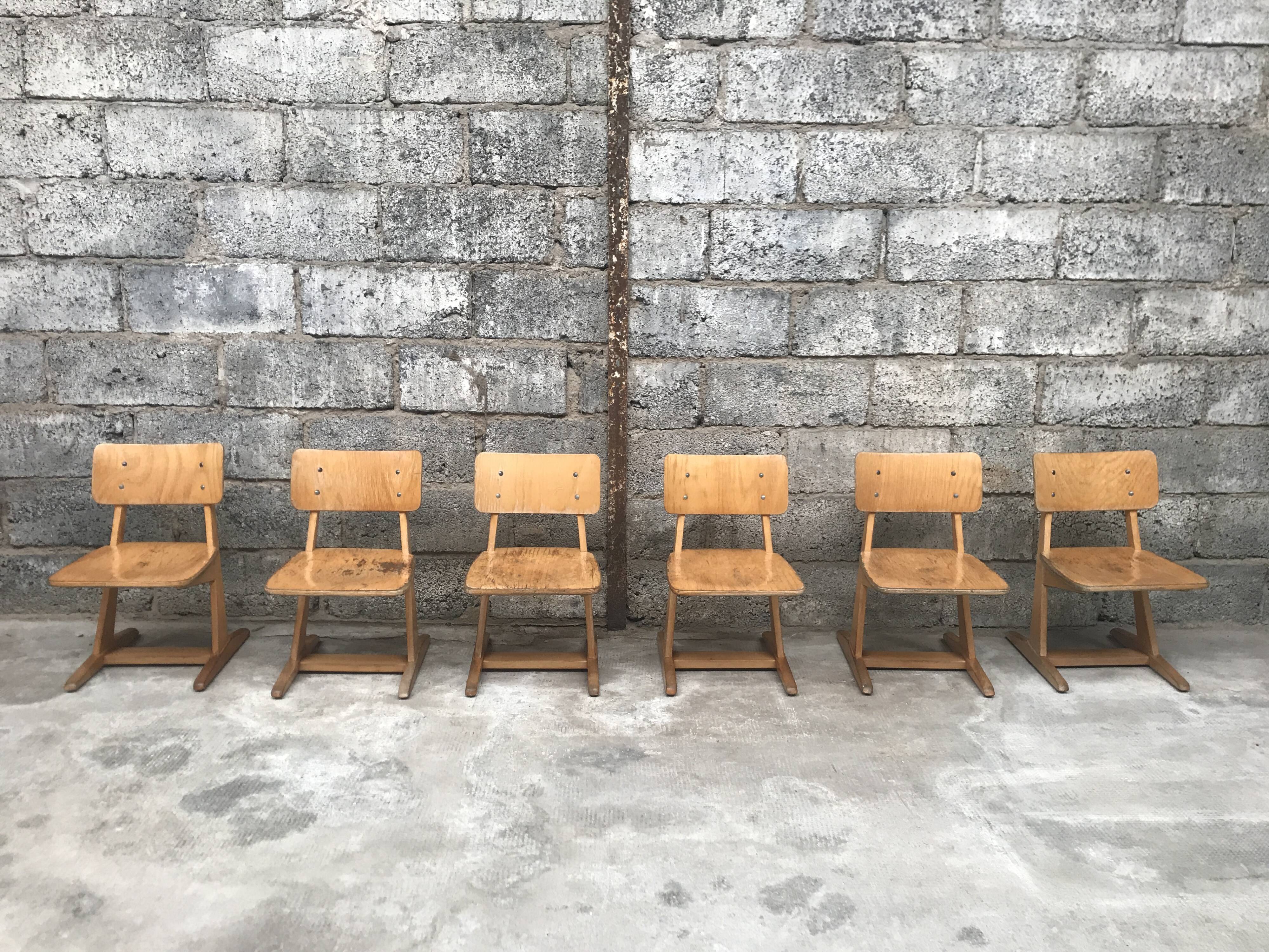 Series of 10 casala children's chairs in vintage light wood
