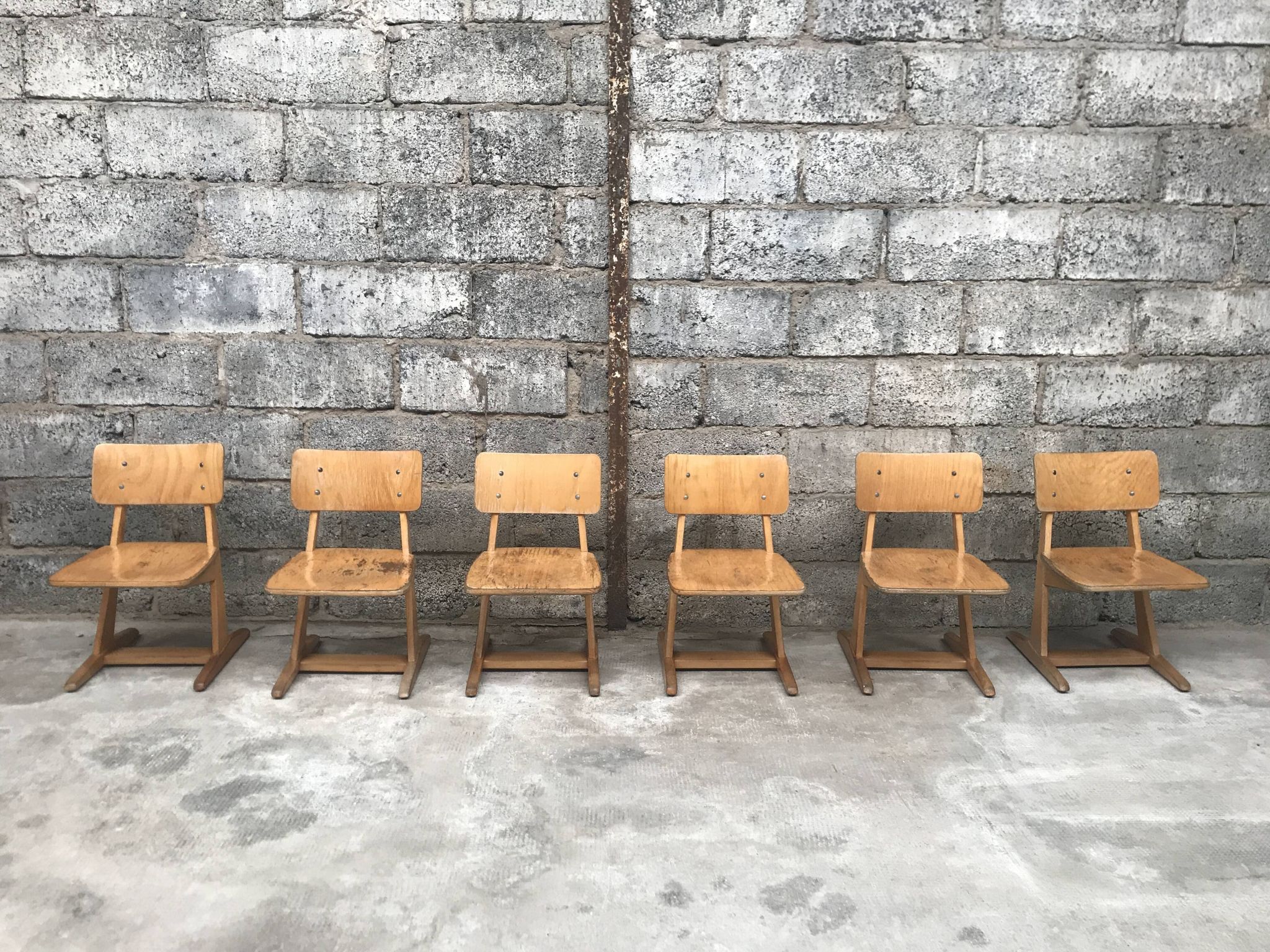 Series of 10 casala children's chairs in vintage light wood