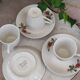 Cups and saucers porcelain flowers