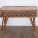 Vintage desk in rattan and wood from the 1960s.