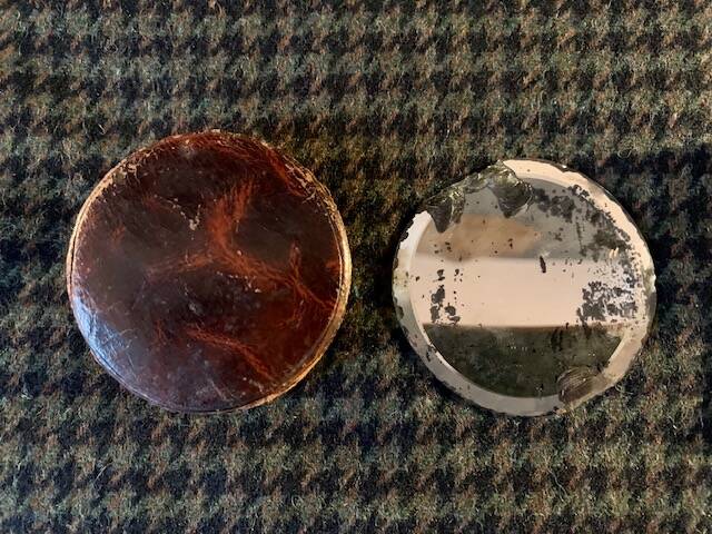 Very old round pocket mirror and leather case, 18th century