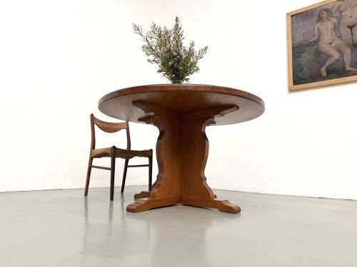 Brutalist round table in solid oak, 1960s.