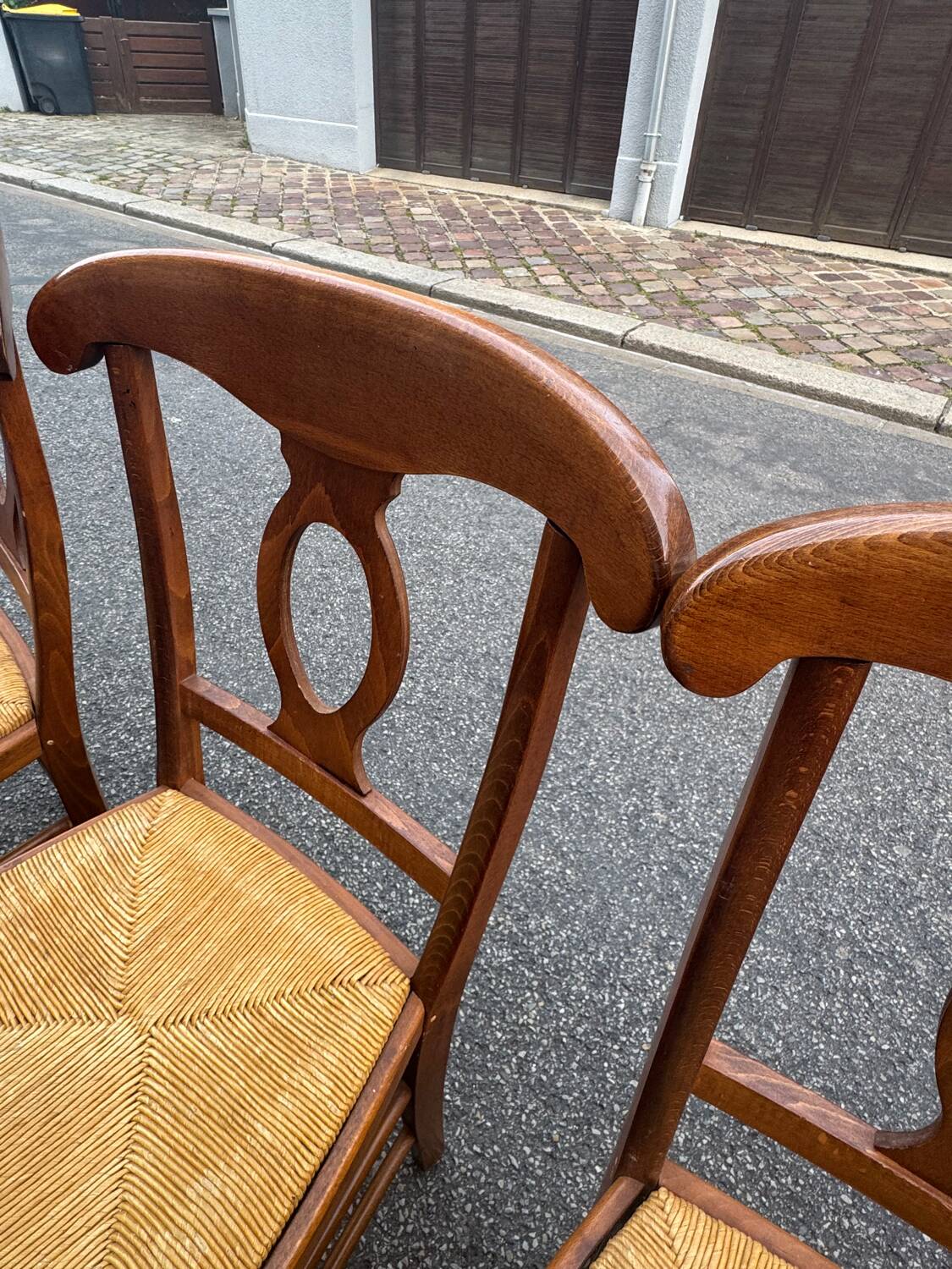 4 straw-seated chairs