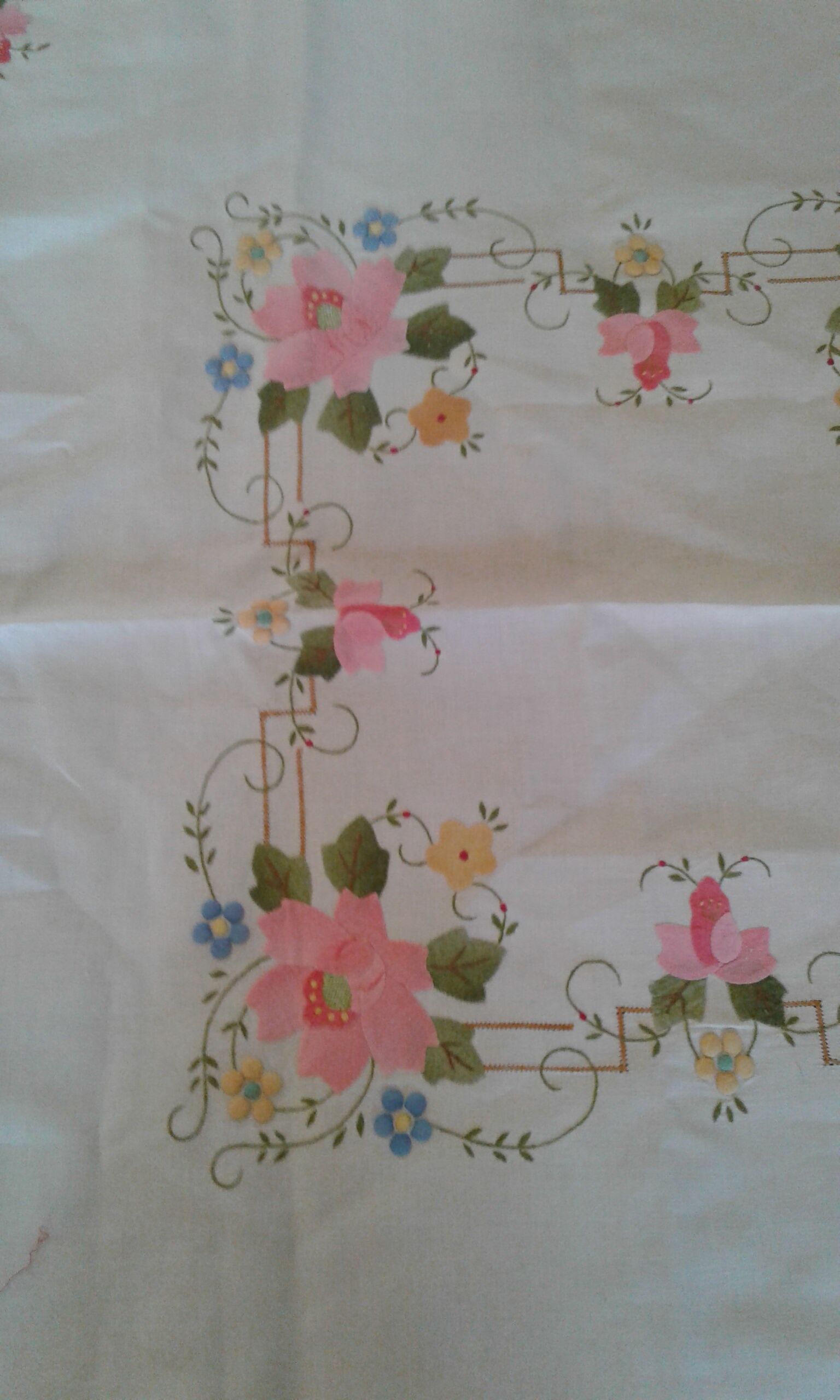 Hand embroidered pink flowers