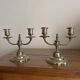 Pair of two-armed candelabra in silver-plated metal