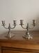 Pair of two-armed candelabra in silver-plated metal