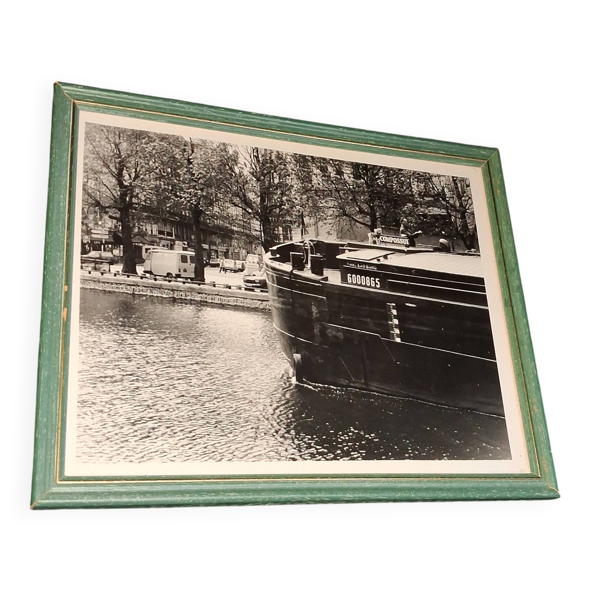 Photo art table of a barge on the Canal Saint Martin in Paris.