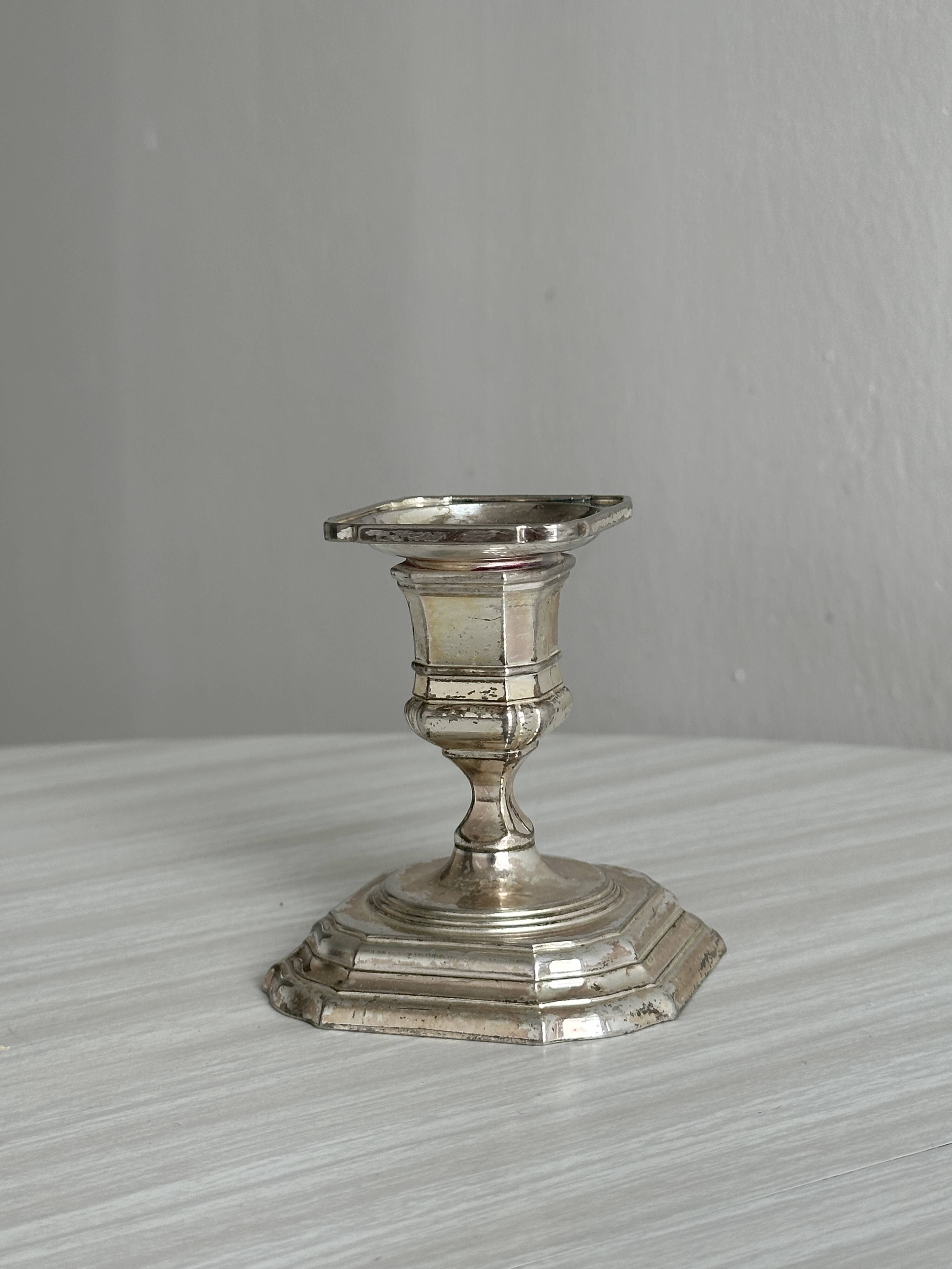 Small antique metal candle holder