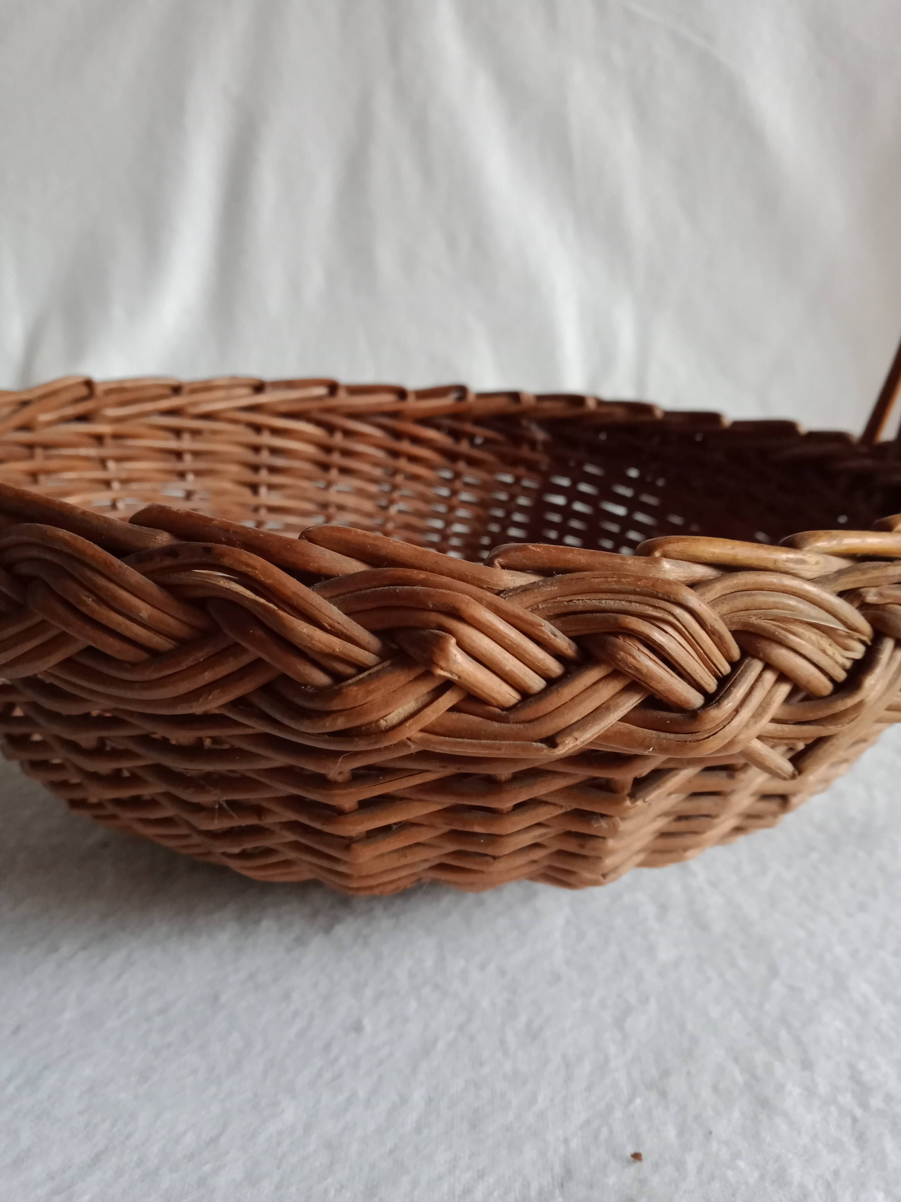 Old basket in braided wicker